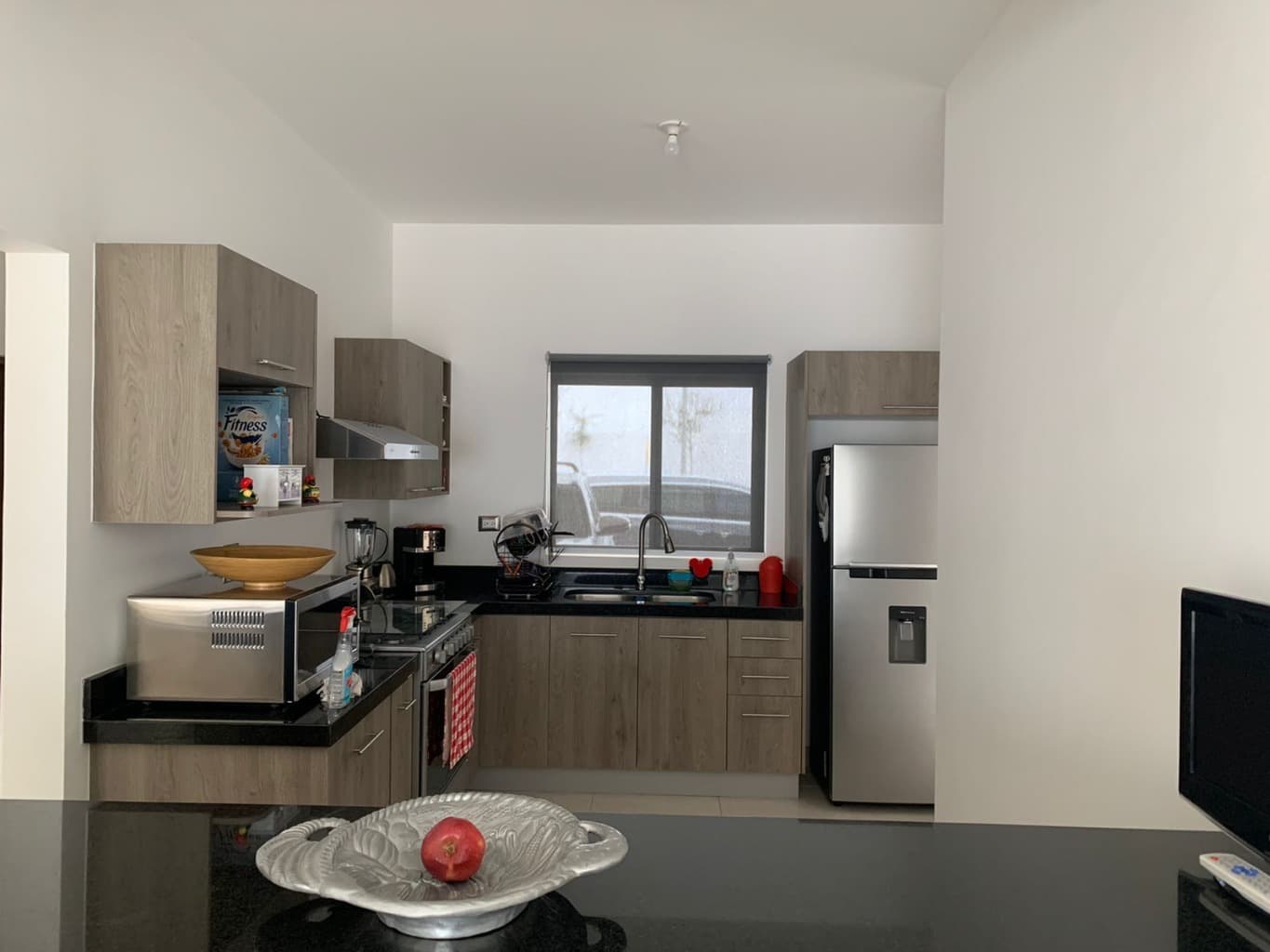 Casa semi amueblada de dos pisos con — foto 2