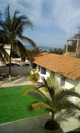 Casa tipo Hostal a medisa calle de playa Zicatela